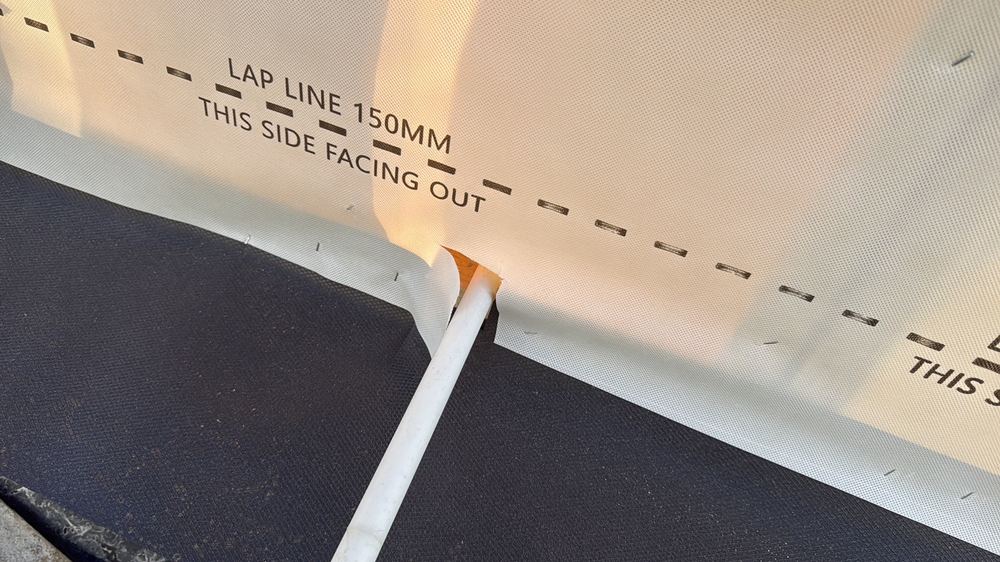 Gaps around sarking penetrations still to be taped or sealed, found during a lock-up inspection in Wollert