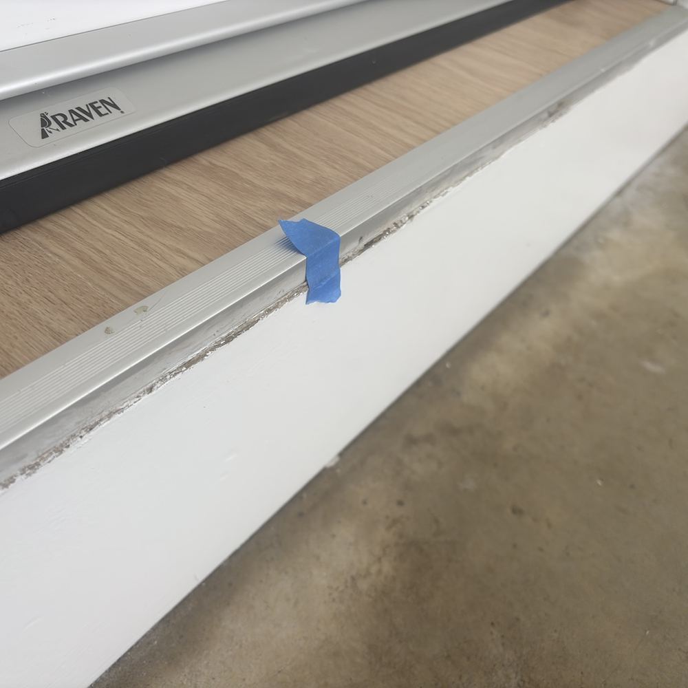 Caulking recommended at the floor and skirting joints as good practice, found during a pre-handover inspection in Wollert