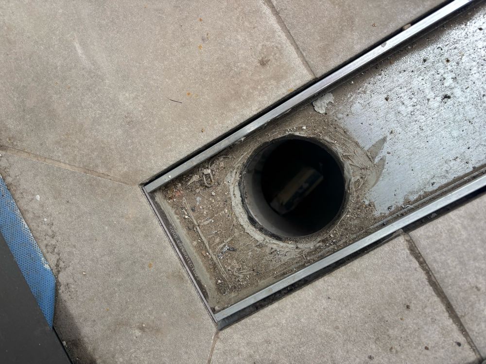 Balcony needing a clean before handover, found during a waterproofing inspection in Wollert
