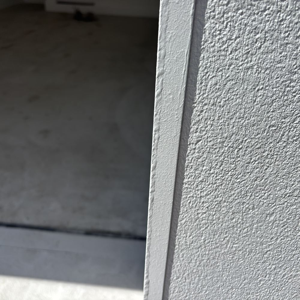 Paint defects through the home marked with flagging tape for fixing before handover, Wollert